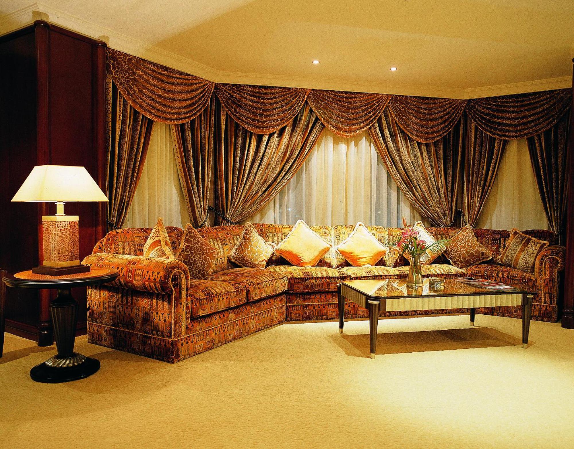 Grand Regency Doha, Trademark Collection By Wyndham Exterior foto A living room