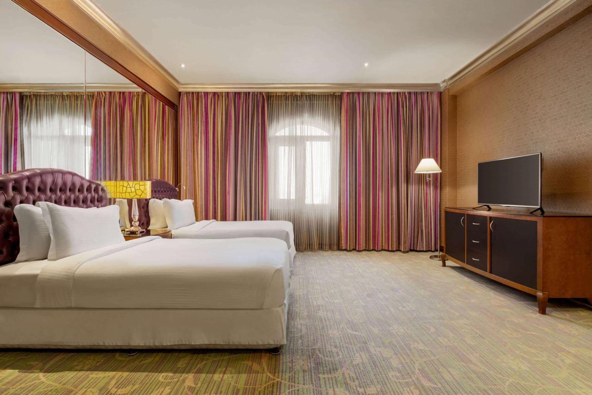 Grand Regency Doha, Trademark Collection By Wyndham Exterior foto A guest room at the hotel