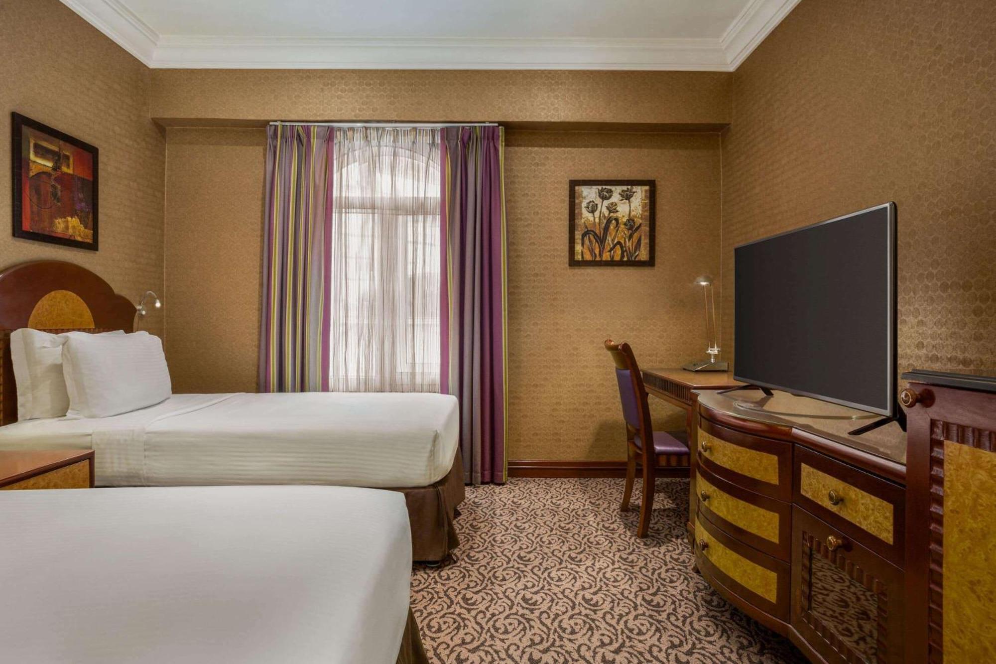Grand Regency Doha, Trademark Collection By Wyndham Exterior foto A room at the Hilton London Paddington